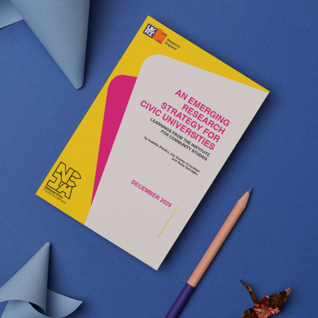 Mockup of an NCIA booklet titled “An Emerging Research Strategy for Civic Universities” on a blue background, with a yellow and pink cover design, pencil, and folded paper props.